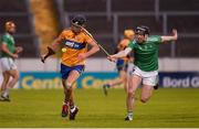 25 October 2020; Cathal Malone of Clare in action against Declan Hannon of Limerick during the Munster GAA Hurling Senior Championship Quarter-Final match between Limerick and Clare at Semple Stadium in Thurles, Tipperary. This game also doubles up as the Allianz Hurling League Division 1 Final as the GAA season was shortened due to the coronavirus pandemic and both teams had qualified for the final. Photo by Daire Brennan/Sportsfile