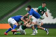 24 October 2020; Peter O'Mahony of Ireland offloads in the tackle by Federico Mori, left, and Carlo Canna of Italy during the Guinness Six Nations Rugby Championship match between Ireland and Italy at the Aviva Stadium in Dublin. Photo by Ramsey Cardy/Sportsfile