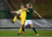 23 October 2020; Nadiya Kunina of Ukraine in action against Louise Quinn of Republic of Ireland during the UEFA Women's EURO 2022 Qualifier match between Ukraine and Republic of Ireland at the Obolon Arena in Kyiv, Ukraine. Photo by Stephen McCarthy/Sportsfile