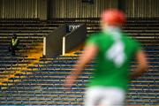 25 October 2020; A 'Maor' watches the game from an empty stand during the Munster GAA Hurling Senior Championship Quarter-Final match between Limerick and Clare at Semple Stadium in Thurles, Tipperary. This game also doubles up as the Allianz Hurling League Division 1 Final as the GAA season was shortened due to the coronavirus pandemic and both teams had qualified for the final. Photo by Ray McManus/Sportsfile