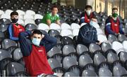 24 October 2020; Limerick subsitutes watch the match socially distanced during the Allianz Football League Division 4 Round 7 match between Sligo and Limerick at Markievicz Park in Sligo. Photo by Harry Murphy/Sportsfile