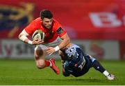 26 October 2020; Calvin Nash of Munster is tackled by Matthew Morgan of Cardiff Blues during the Guinness PRO14 match between Munster and Cardiff Blues at Thomond Park in Limerick. Photo by Ramsey Cardy/Sportsfile