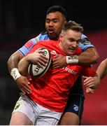 26 October 2020; Rory Scannell of Munster is tackled by Willis Halaholo of Cardiff Blues during the Guinness PRO14 match between Munster and Cardiff Blues at Thomond Park in Limerick. Photo by Ramsey Cardy/Sportsfile