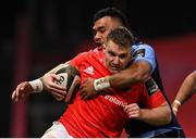 26 October 2020; Rory Scannell of Munster is tackled by Willis Halaholo of Cardiff Blues during the Guinness PRO14 match between Munster and Cardiff Blues at Thomond Park in Limerick. Photo by Ramsey Cardy/Sportsfile