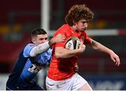 26 October 2020; Ben Healy of Munster is tackled by Lewis Jones of Cardiff Blues during the Guinness PRO14 match between Munster and Cardiff Blues at Thomond Park in Limerick. Photo by Harry Murphy/Sportsfile