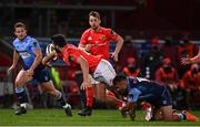 26 October 2020; Damian De Allende of Munster offloads to Darren Sweetnam of Munster despite the tackle of James Botham of Cardiff Blues during the Guinness PRO14 match between Munster and Cardiff Blues at Thomond Park in Limerick. Photo by Harry Murphy/Sportsfile