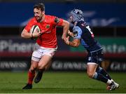 26 October 2020; Darren Sweetnam of Munster is tackled by Matthew Morgan of Cardiff Blues during the Guinness PRO14 match between Munster and Cardiff Blues at Thomond Park in Limerick. Photo by Harry Murphy/Sportsfile