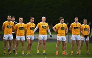 24 October 2020; Antrim players stand for Amhrán na bhFiann prior to the Allianz Football League Division 4 Round 7 match between Antrim and Waterford at McGeough Park in Haggardstown, Louth. Photo by David Fitzgerald/Sportsfile