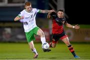 27 October 2020; Jonathan Carlin of Cabinteely of in action against Chris Lyons of Drogheda United during the SSE Airtricity League First Division match between Cabinteely and Drogheda United at Stradbrook in Blackrock, Dublin. Photo by Stephen McCarthy/Sportsfile