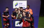 27 October 2020; Jack Tuite of Drogheda United and team-mates celebrate with the SSE Airtricity First Division trophy following their match against Cabinteely at Stradbrook in Blackrock, Dublin. Photo by Stephen McCarthy/Sportsfile