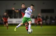 27 October 2020; Zak O’Neill of Cabinteely in action against Chris Lyons of Drogheda United during the SSE Airtricity League First Division match between Cabinteely and Drogheda United at Stradbrook in Blackrock, Dublin. Photo by Stephen McCarthy/Sportsfile
