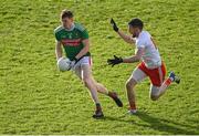 25 October 2020; Matthew Ruane of Mayo in action against Mattie Donnelly of Tyrone during the Allianz Football League Division 1 Round 7 match between Mayo and Tyrone at Elverys MacHale Park in Castlebar, Mayo. Photo by Piaras Ó Mídheach/Sportsfile