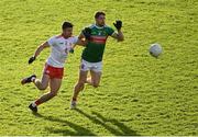 25 October 2020; Lee Keegan of Mayo in action against Darren McCurry of Tyrone during the Allianz Football League Division 1 Round 7 match between Mayo and Tyrone at Elverys MacHale Park in Castlebar, Mayo. Photo by Piaras Ó Mídheach/Sportsfile