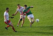 25 October 2020; Conor Loftus of Mayo shoots under pressure from Liam Rafferty and Ronan McNamee of Tyrone during the Allianz Football League Division 1 Round 7 match between Mayo and Tyrone at Elverys MacHale Park in Castlebar, Mayo. Photo by Piaras Ó Mídheach/Sportsfile