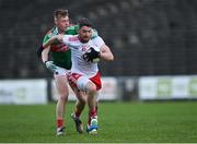 25 October 2020; Mattie Donnelly of Tyrone in action against Bryan Walsh of Mayo during the Allianz Football League Division 1 Round 7 match between Mayo and Tyrone at Elverys MacHale Park in Castlebar, Mayo. Photo by Piaras Ó Mídheach/Sportsfile