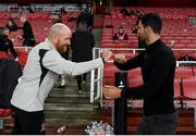 29 October 2020; Dundalk opposition analyst Shane Keegan, left, and Arsenal manager Mikel Arteta prior to the UEFA Europa League Group B match between Arsenal and Dundalk at the Emirates Stadium in London, England. Photo by Ben McShane/Sportsfile