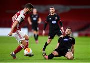 29 October 2020; Shkodran Mustafi of Arsenal is tackled by Patrick Hoban of Dundalk during the UEFA Europa League Group B match between Arsenal and Dundalk at the Emirates Stadium in London, England. Photo by Ben McShane/Sportsfile