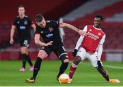 29 October 2020; Patrick McEleney of Dundalk in action against Eddie Nketiah of Arsenal during the UEFA Europa League Group B match between Arsenal and Dundalk at the Emirates Stadium in London, England. Photo by Ben McShane/Sportsfile