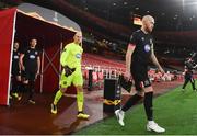 29 October 2020; Dundalk captain Chris Shields leads his side out ahead of the UEFA Europa League Group B match between Arsenal and Dundalk at the Emirates Stadium in London, England. Photo by Ben McShane/Sportsfile