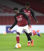 29 October 2020; Bukayo Saka, left, and Thomas Partey of Arsenal ahead of the UEFA Europa League Group B match between Arsenal and Dundalk at the Emirates Stadium in London, England. Photo by Ben McShane/Sportsfile