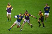 24 October 2020; Dean Healy of Wicklow in action against Daithi Waters of Wexford during the Allianz Football League Division 4 Round 7 match between Wexford and Wicklow at Chadwicks Wexford Park in Wexford. Photo by Sam Barnes/Sportsfile