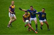 24 October 2020; Glen Malone of Wexford in action against Rory Finn, left, and Darren Hayden of Wicklow during the Allianz Football League Division 4 Round 7 match between Wexford and Wicklow at Chadwicks Wexford Park in Wexford. Photo by Sam Barnes/Sportsfile
