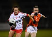 30 October 2020; Chloe McCaffrey of Tyrone in action against Sarah Marley of Armagh during the TG4 All-Ireland Senior Ladies Football Championship Round 1 match between Tyrone and Armagh at Kingspan Breffni Park in Cavan. Photo by Stephen McCarthy/Sportsfile