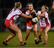 30 October 2020; Catherine Marley of Armagh in action against Aoibhinn McHugh, left, and Emma Mulgrew of Tyrone during the TG4 All-Ireland Senior Ladies Football Championship Round 1 match between Tyrone and Armagh at Kingspan Breffni Park in Cavan. Photo by Stephen McCarthy/Sportsfile