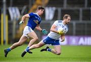 31 October 2020; Conor Boyle of Monaghan in action against Killian Brady of Cavan during the Ulster GAA Football Senior Championship Preliminary Round match between Monaghan and Cavan at St Tiernach’s Park in Clones, Monaghan. Photo by Stephen McCarthy/Sportsfile