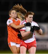 30 October 2020; Niamh O'Niell of Tyrone in action against Grace Ferguson of Armagh during the TG4 All-Ireland Senior Ladies Football Championship Round 1 match between Tyrone and Armagh at Kingspan Breffni Park in Cavan. Photo by Stephen McCarthy/Sportsfile