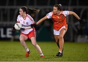 30 October 2020; Grainne Rafferty of Tyrone in action against Tiarna Grimes of Armagh during the TG4 All-Ireland Senior Ladies Football Championship Round 1 match between Tyrone and Armagh at Kingspan Breffni Park in Cavan. Photo by Stephen McCarthy/Sportsfile