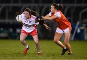 30 October 2020; Grainne Rafferty of Tyrone in action against Tiarna Grimes of Armagh during the TG4 All-Ireland Senior Ladies Football Championship Round 1 match between Tyrone and Armagh at Kingspan Breffni Park in Cavan. Photo by Stephen McCarthy/Sportsfile