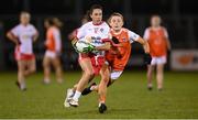30 October 2020; Niamh Hughes of Tyrone in action against Grace Ferguson of Armagh during the TG4 All-Ireland Senior Ladies Football Championship Round 1 match between Tyrone and Armagh at Kingspan Breffni Park in Cavan. Photo by Stephen McCarthy/Sportsfile