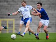 31 October 2020; Conor McManus of Monaghan shoots to score his side's first goal despite the attention of Gerard Smith of Cavan during the Ulster GAA Football Senior Championship Preliminary Round match between Monaghan and Cavan at St Tiernach’s Park in Clones, Monaghan. Photo by Stephen McCarthy/Sportsfile