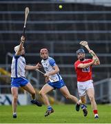 31 October 2020; Conor Lehane of Cork passes the sliotar to a team-mate over the head of Shane McNulty of Waterford during the Munster GAA Hurling Senior Championship Semi-Final match between Cork and Waterford at Semple Stadium in Thurles, Tipperary. Photo by Brendan Moran/Sportsfile