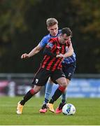 31 October 2020; Dylan Grimes of Longford Town in action against Jack Keaney of UCD during the SSE Airtricity League First Division Play-off Semi-Final match between UCD and Longford Town at the UCD Bowl in Belfield, Dublin. Photo by Sam Barnes/Sportsfile