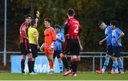 31 October 2020; Lorcan Healy of UCD is shown a yellow card by referee Kevin O'Sullivan during the SSE Airtricity League First Division Play-off Semi-Final match between UCD and Longford Town at the UCD Bowl in Belfield, Dublin. Photo by Sam Barnes/Sportsfile