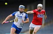 31 October 2020; Stephen Bennett of Waterford in action against Damien Cahalane of Cork during the Munster GAA Hurling Senior Championship Semi-Final match between Cork and Waterford at Semple Stadium in Thurles, Tipperary. Photo by Brendan Moran/Sportsfile
