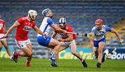 31 October 2020; Seán O'Donoghue of Cork is tackled by Stephen Bennett and Jack Prendergast of Waterford, right, during the Munster GAA Hurling Senior Championship Semi-Final match between Cork and Waterford at Semple Stadium in Thurles, Tipperary. Photo by Brendan Moran/Sportsfile