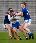 31 October 2020; Dermot Malone of Monaghan in action against Thomas Edward Donohoe, left, and Evan Doughty of Cavan during the Ulster GAA Football Senior Championship Preliminary Round match between Monaghan and Cavan at St Tiernach’s Park in Clones, Monaghan. Photo by Stephen McCarthy/Sportsfile