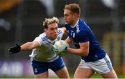 31 October 2020; Padraig Faulkner of Cavan in action against Niall Kearns of Monaghan during the Ulster GAA Football Senior Championship Preliminary Round match between Monaghan and Cavan at St Tiernach’s Park in Clones, Monaghan. Photo by Stephen McCarthy/Sportsfile