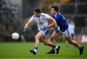 31 October 2020; Dessie Ward of Monaghan in action against Killian Brady of Cavan during the Ulster GAA Football Senior Championship Preliminary Round match between Monaghan and Cavan at St Tiernach’s Park in Clones, Monaghan. Photo by Stephen McCarthy/Sportsfile