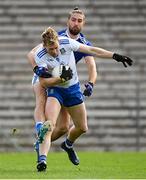 31 October 2020; Kieran Hughes of Monaghan in action against Killian Clarke of Cavan during the Ulster GAA Football Senior Championship Preliminary Round match between Monaghan and Cavan at St Tiernach’s Park in Clones, Monaghan. Photo by Stephen McCarthy/Sportsfile