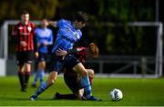 31 October 2020; Dara Keane of UCD in action against Aodh Dervin of Longford Town during the SSE Airtricity League First Division Play-off Semi-Final match between UCD and Longford Town at the UCD Bowl in Belfield, Dublin. Photo by Sam Barnes/Sportsfile