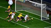 31 October 2020; Brian Concannon of Galway scores his side's first goal, despite the challenge of Simon Donohoe, left, and Mark Fanning of Wexford during the Leinster GAA Hurling Senior Championship Semi-Final match between Galway and Wexford at Croke Park in Dublin. Photo by Daire Brennan/Sportsfile