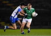 31 October 2020; Adrian Enright of Limerick in action against Darach Ó Cathasaigh of Waterford during the Munster GAA Football Senior Championship Quarter-Final match between Waterford and Limerick at Fraher Field in Dungarvan, Waterford. Photo by Matt Browne/Sportsfile