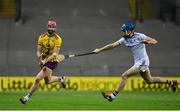 31 October 2020; Paudie Foley of Wexford in action against Conor Cooney of Galway during the Leinster GAA Hurling Senior Championship Semi-Final match between Galway and Wexford at Croke Park in Dublin. Photo by Ramsey Cardy/Sportsfile