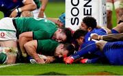 31 October 2020; Cian Healy of Ireland, with the help of team-mate James Ryan, scores his side's first try during the Guinness Six Nations Rugby Championship match between France and Ireland at Stade de France in Paris, France. Photo by Sportsfile