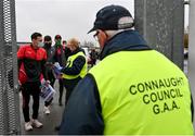 1 November 2020; Diarmuid O'Connor of Mayo checks in with Patrick Feeley, Leitrim Delegate, Connacht GAA Council, ahead of the Connacht GAA Football Senior Championship Quarter-Final match between Leitrim and Mayo at Avantcard Páirc Sean Mac Diarmada in Carrick-on-Shannon, Leitrim. Photo by Ramsey Cardy/Sportsfile