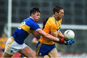 1 November 2020; Gary Brennan of Clare in action against Conal Kennedy of Tipperary during the Munster GAA Football Senior Championship Quarter-Final match between Tipperary and Clare at Semple Stadium in Thurles, Tipperary. Photo by Diarmuid Greene/Sportsfile